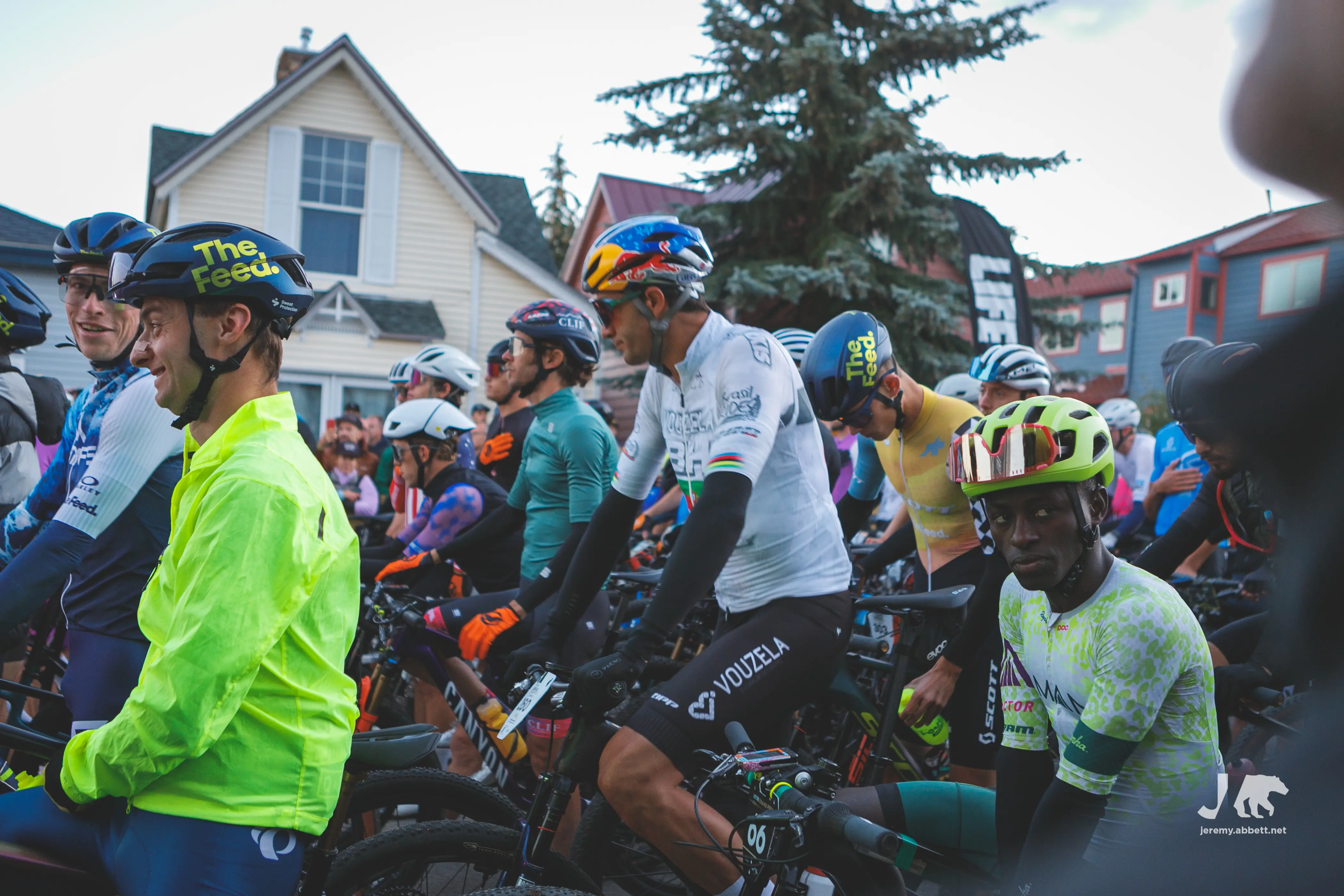 John Gaston and Alexey Vermeulen joking around while Jordan Schleck anticipates climbing 3,658m to the summit of 3,658m above sea level.